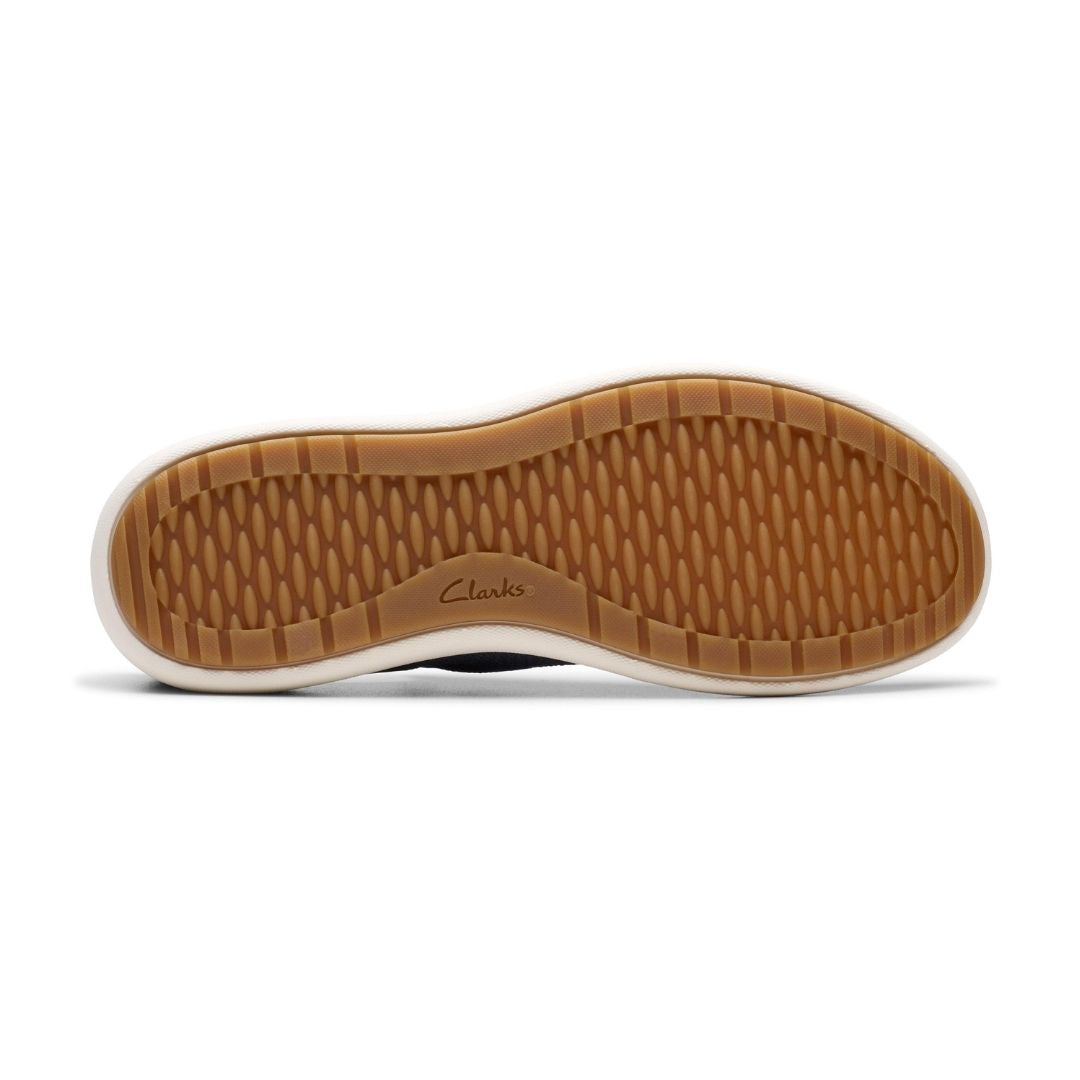 Bottom view of Clarks Nalle Step Knit Sneaker in blue. Rubber outsole with patterned tread for grip and durability in everyday activities.