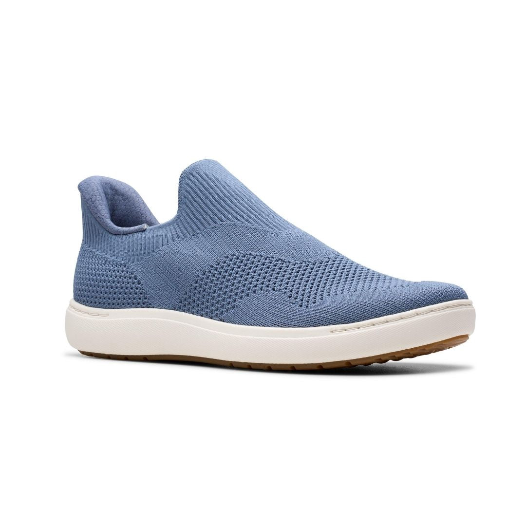 Women's Clarks Nalle Step Knit Sneaker in blue with a flexible knit upper and cushioned insole. Lightweight slip-on sneaker for all-day comfort.