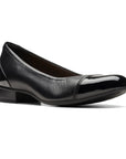 Women's Clarks Juliet Step Flat in black leather with patent toe cap, ideal for dressy occasions and office wear.