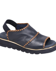 Navy sandal with brown stitching accents, elastic backstrap, navy footbed and outsole.