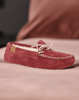 Canadian-made Women's Vancouver Moccasin Slippers in red suede, featuring cozy lining and durable sole, perfect for home or casual outdoor use.