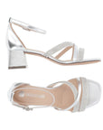 Side and top views of silver Remonte D1L51 sling-back heel featuring sparkling straps and cushioned footbed.
