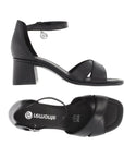 Top and side views of the black Remonte D1K50 sling-back sandal featuring leather upper, block heel, and secure ankle strap with charm detail.