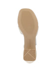 Outsole view of the beige Remonte D1K50 sling-back sandal highlighting the textured rubber sole and block heel for added grip and comfort.