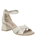 Women's Remonte D1K50 sling-back block-heeled sandal in metallic beige with ankle strap and crisscross leather front, ideal for dressy occasions.