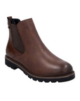 Brown Chelsea boot with side goring and lugged outsole.