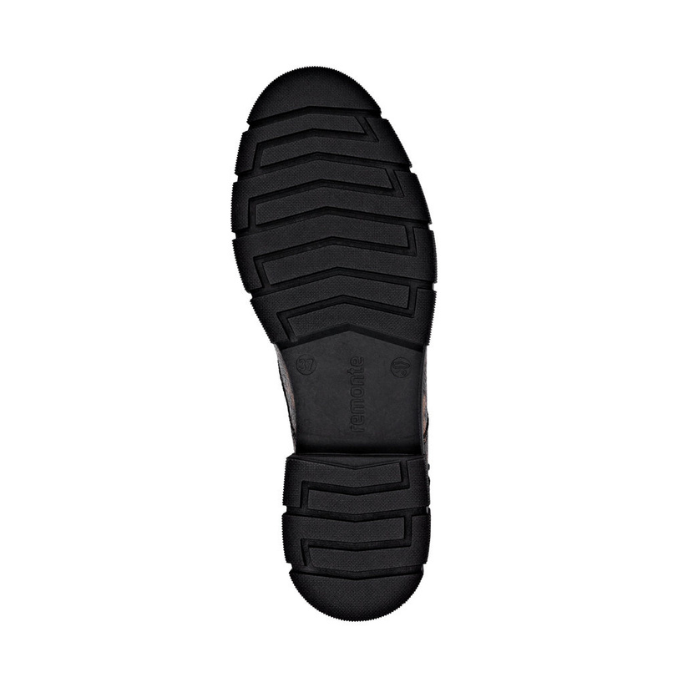 Black treaded rubber outsole of combat boot with Remonte logo stamped in middle.