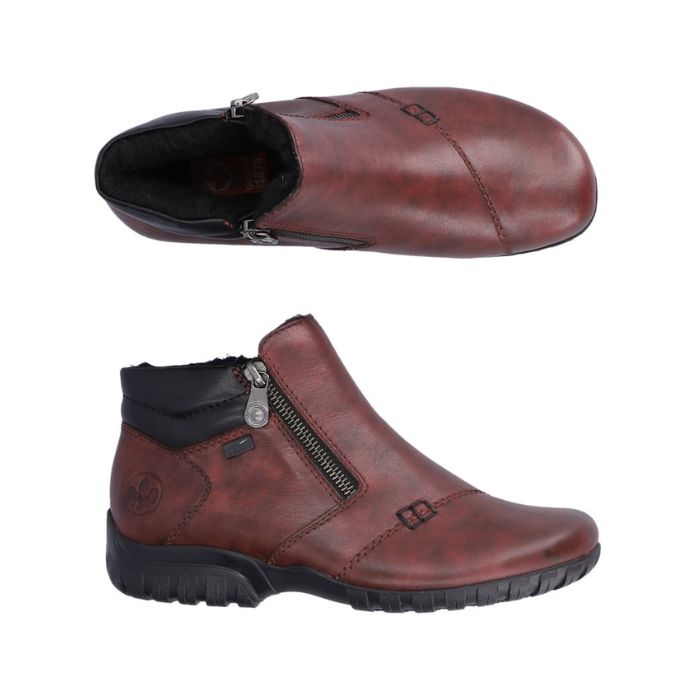Top and side view of red ankle boot with black outsole and outside zipper closure.
