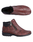 Top and side view of red ankle boot with black outsole and outside zipper closure.