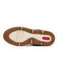 Off-white treaded outsole with tan border and red Rieker logo stamped in heel.
