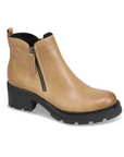 Yellow ankle boot with side zipper, pull tab and black lugged outsole.