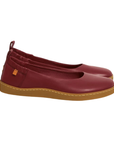 Pair of burgundy ballet flats with heel tab, and tan outsole