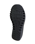 A black rubber outsole with waved and lugged tread pattern and embossed branding with the text 'FLY LONDON' and a fly logo.