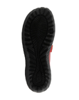 Black light treaded outsole of Mary-Jane flat.