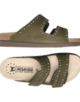 Pair of green slide sandals with silver stud accents, two thick Velcro straps, tan Mephisto logo'd footbed, cork midsole and brown outsole.