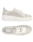 Pair of Dusted gold sneakers with white laces, gold dragonfly lace charm, grey Remonte logo'd footbed and white platform outsole.