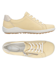 Pair of pale yellow Lace-up sneakers with pale gold accents, side zipper, accent stitching, grey Remonte logo'd footbed and white midsole.