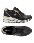 Pair of Black lace-up sneakers with gold accents, side zipper and black laces, black Remonte logo'd footbed, white midsole with black wave lines and black outsole.