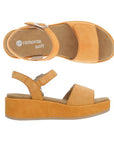 Pair of Soft orange suede backstrap sandal with velcro closures, tan footbed with Remonte logo at heel and a platform outsole.