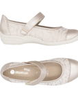 Pair of Beige Mary Jane shoe with gold accents, tan Remonte logo'd footbed and a off-white outsole.