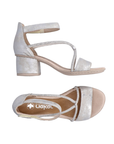 Pair of Silver sandals with decorative sparkly straps, Velcro ankle strap, tan Rieker logo'd footbed and a block heel.