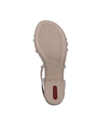 Beige light treaded outsole of sandal with red Rieker block heel.