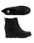 Pair of Black leather slip on wedge Chelsea boots with white Sorel logo on footbed and a lugged outsole.