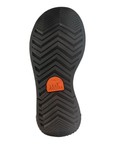 Black treaded outsole of rain boot with orange Sorel logo stamped in middle.