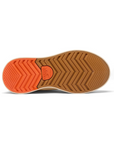 Bottom view of beige Sorel Out N About IV Classic boot outsole, featuring orange and gum rubber tread for superior grip.