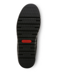 Outsole of Women's Vionic Uptown Ballet Flat featuring textured grip and Vionic logo for enhanced traction and support.