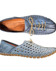 Pair of women's blue leather elastic lace shoe with square perforated upper, tan Volks Walkers logo'd footbed and stitched sole.