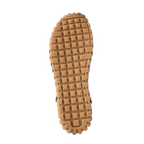 Outsole of tan lace-up shoe with square grippy tread pattern.