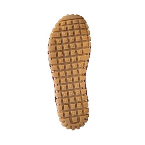 Outsole of lace-up shoe with square patter grippy rubber tread.