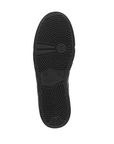 Black rubber outsole with circle tread pattern.