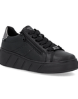 Black sneaker with a zipper, silver heel accent, thick black outsole.