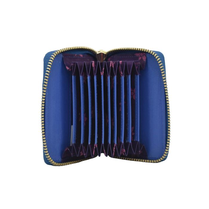 Open view of Anuschka&#39;s blue accordion style wallet showing card compartments.