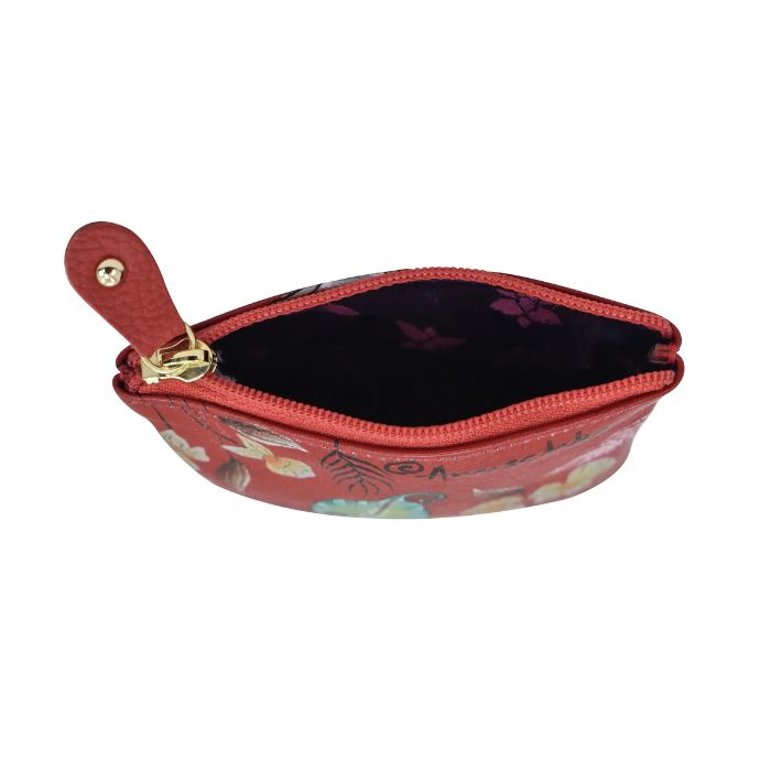 Open view of red leather coin purse with hand painted design.