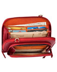 Interior of the organizer crossbody bag, revealing card slots and a zippered pocket in the main compartment and slip pockets in the front compartment.