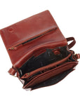 Interior view of the 3/4 flap organizer bag in whiskey. Displays the multiple zippered pockets, key ring, card slots, and slip pockets.