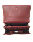 Interior of half flap crossbody bag in red. Lining is black with red leather trim. Displays multiple zippered pockets, card slots, and two main compartments.