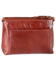 Interior side of 3 top zip cross body bag in whiskey, featuring the slip pocket with a magnetic closure.