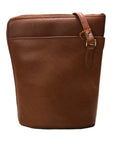Warm brown Derek Alexander two sided crossbody handbag crafted in soft leather with a front pocket and adjustable strap.