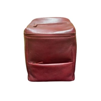 Burgundy leather bucket-style backpack with zippered closure and two zippered pockets on the front and top of bag.