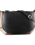 Black leather bag with rounded corners and bronze/pewter leather trim. Features an adjustable strap and top zip closure.