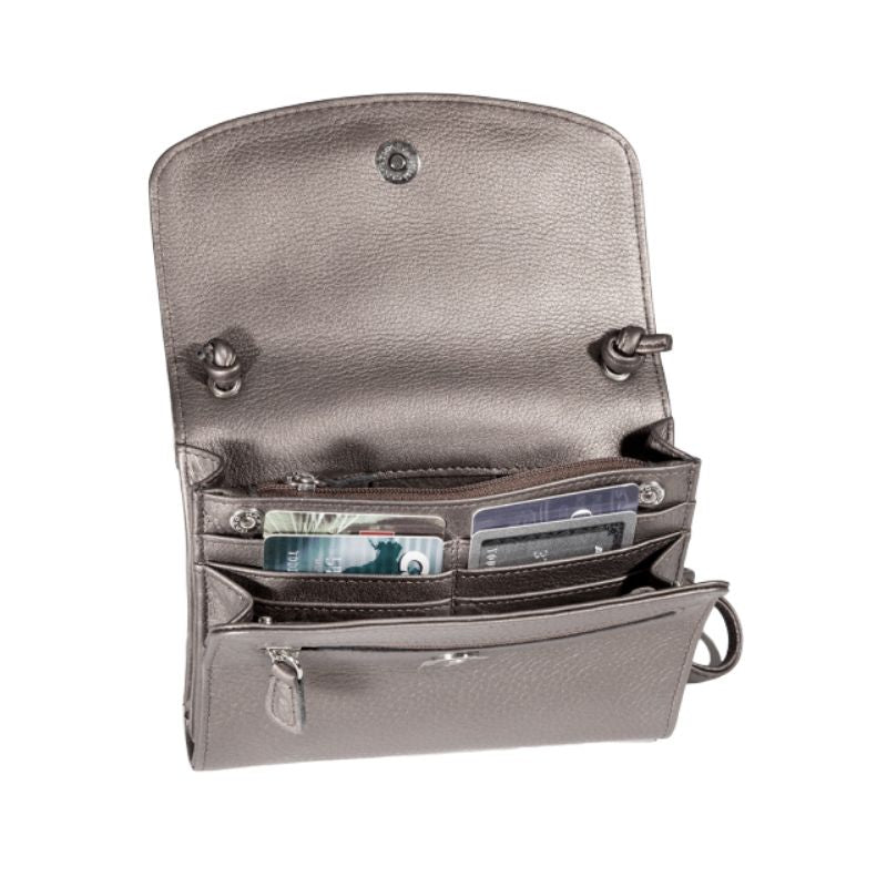 Interior view of Derek Alexander Half Flap Leather Crossbody Organizer Bag showing 8 card slots, 3 compartments, and zippered pocket.