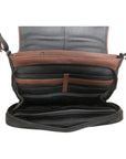 The inside of the black leather handbag has many pockets for cards, cellphone or money with brown contrasting areas for decor