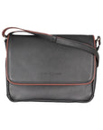 Black leather hand bag with a brown contrast outline and a shoulder strap by Derek Alexander