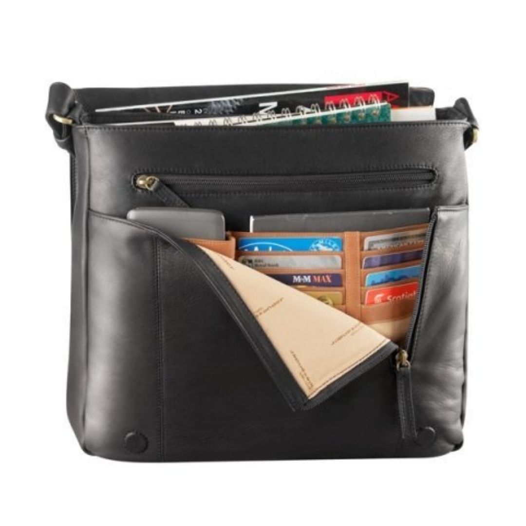 Black leather messenger bag with front compartment opened, displaying multiple card slots, a cell phone, and a notebook placed inside the various pockets. Inside the main compartment is a notebook and some magazines.