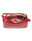 Top view of a red leather purse. One of the compartments is opened to display the organizational features. The lining is beige.