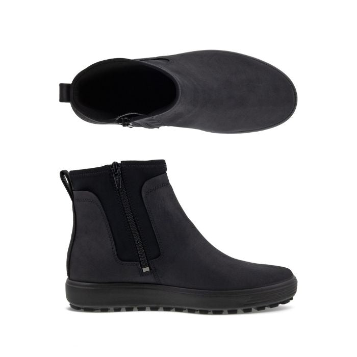 A pair of Ecco black nubuck ankle boots with textile side paneling and a black outsole.